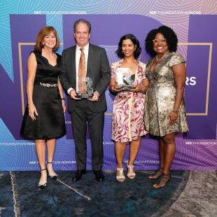 PwC’s Barbra Bukovac, Five Below’s Joel Anderson (holding trophy), Neela Montgomery (holding trophy), Colleen Taylor of American Express 