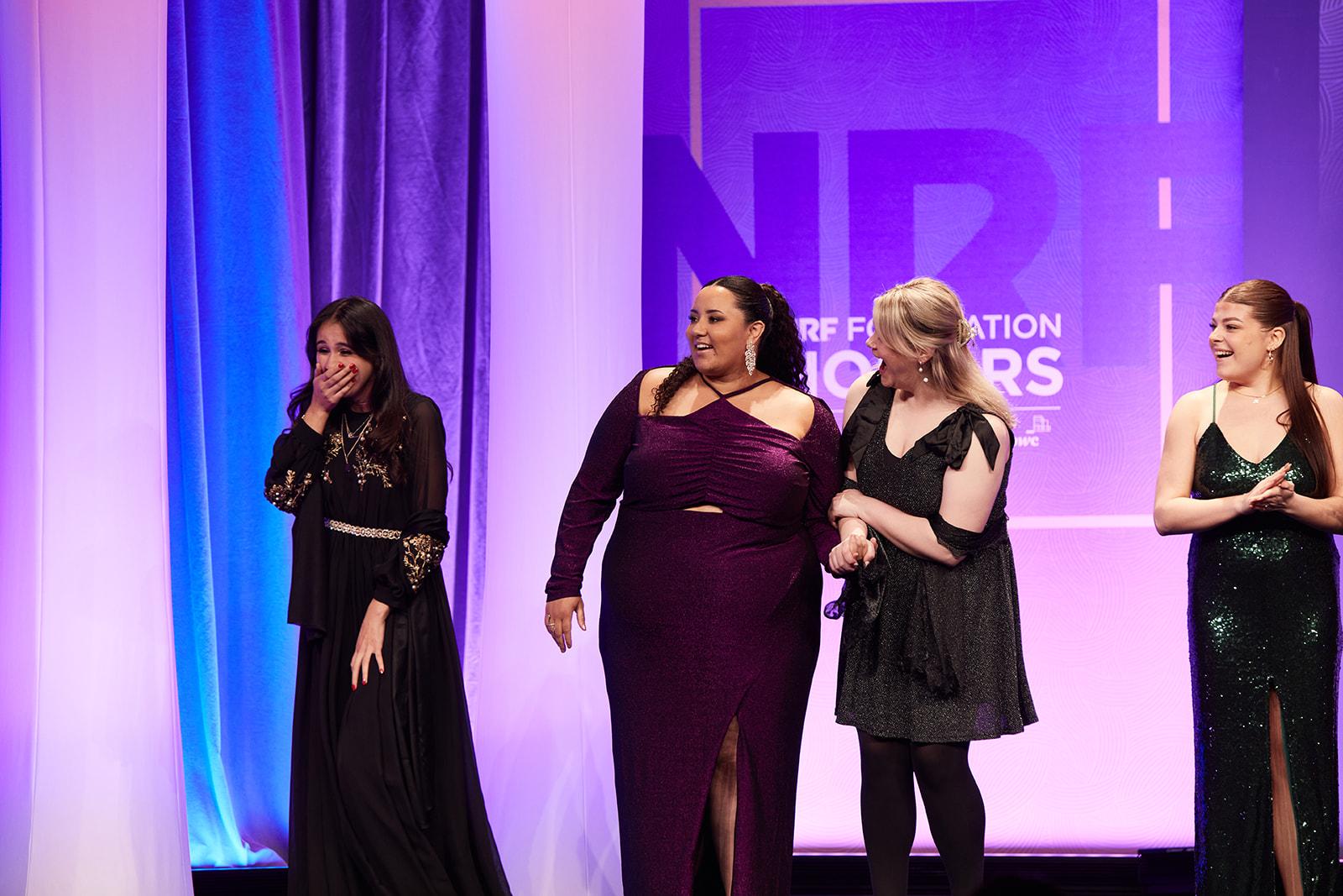 Three members of top team onstage at the NRF Foundation Honors