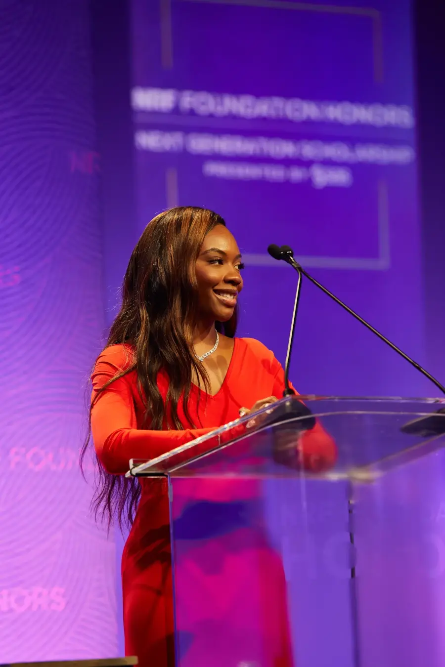 Amaiya Sims speaks onstage at the NRF Foundation Honors in 2021