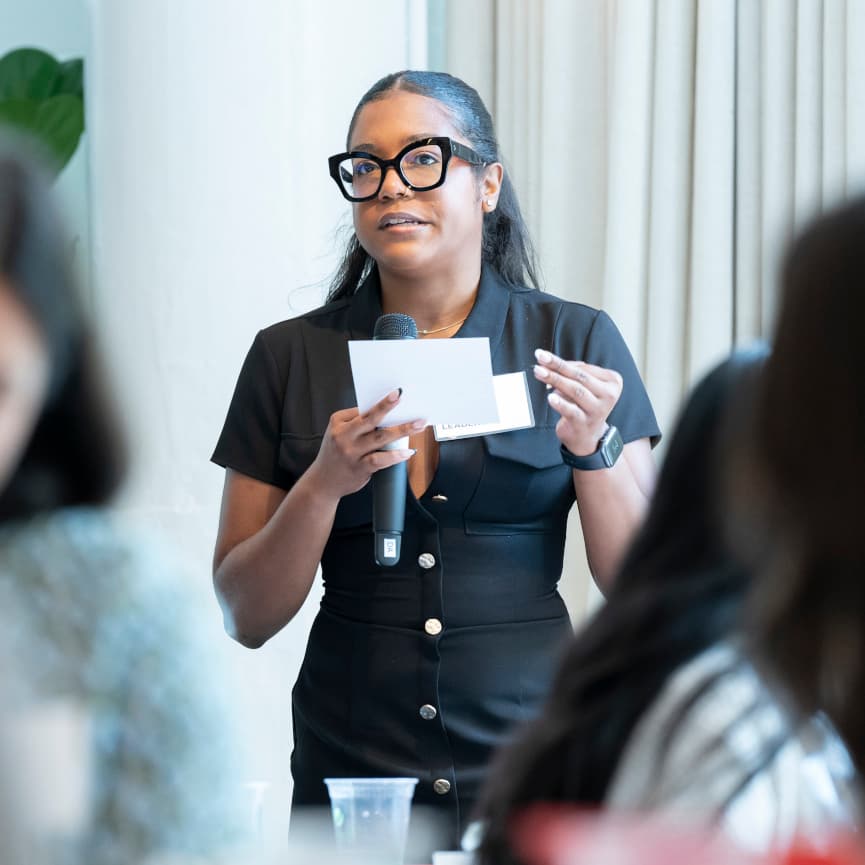 A summit attendee shares her thoughts during an Emerging Leaders Summit panel.