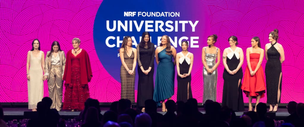 2024 University Challenge finalists await the winner announcement on stage at NRF Foundation Student Program.